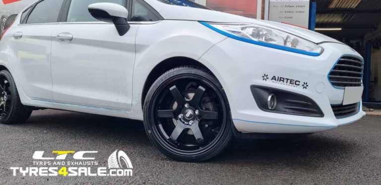 Bola B1 17" Gloss Black Alloy Wheels and 205/40 17 Economy Tyres for Ford Fiesta
