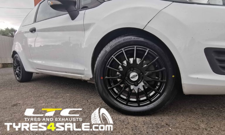 FX004 Alloy Wheels Gloss Balck and Economy Tyres 15" Ford Fiesta