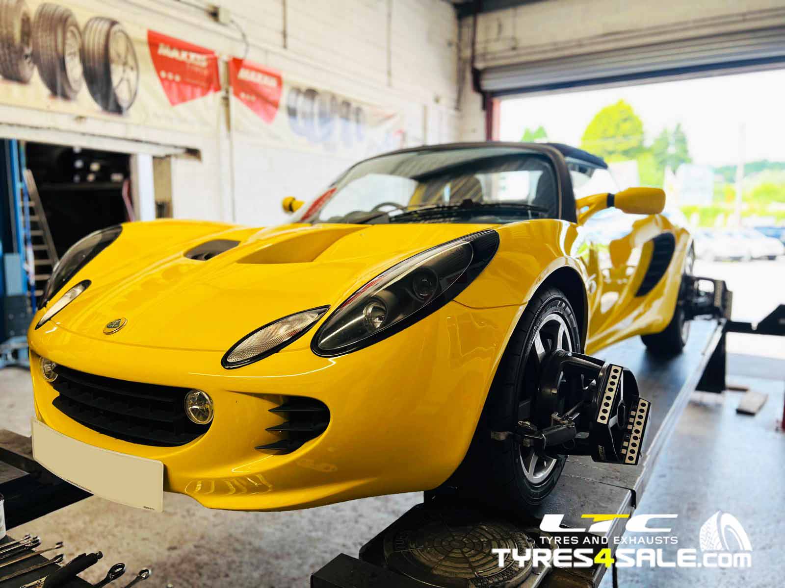 Lotus Elise undergoing Hunter HawkEye four wheel alignment at LTC Tyres and Exhausts