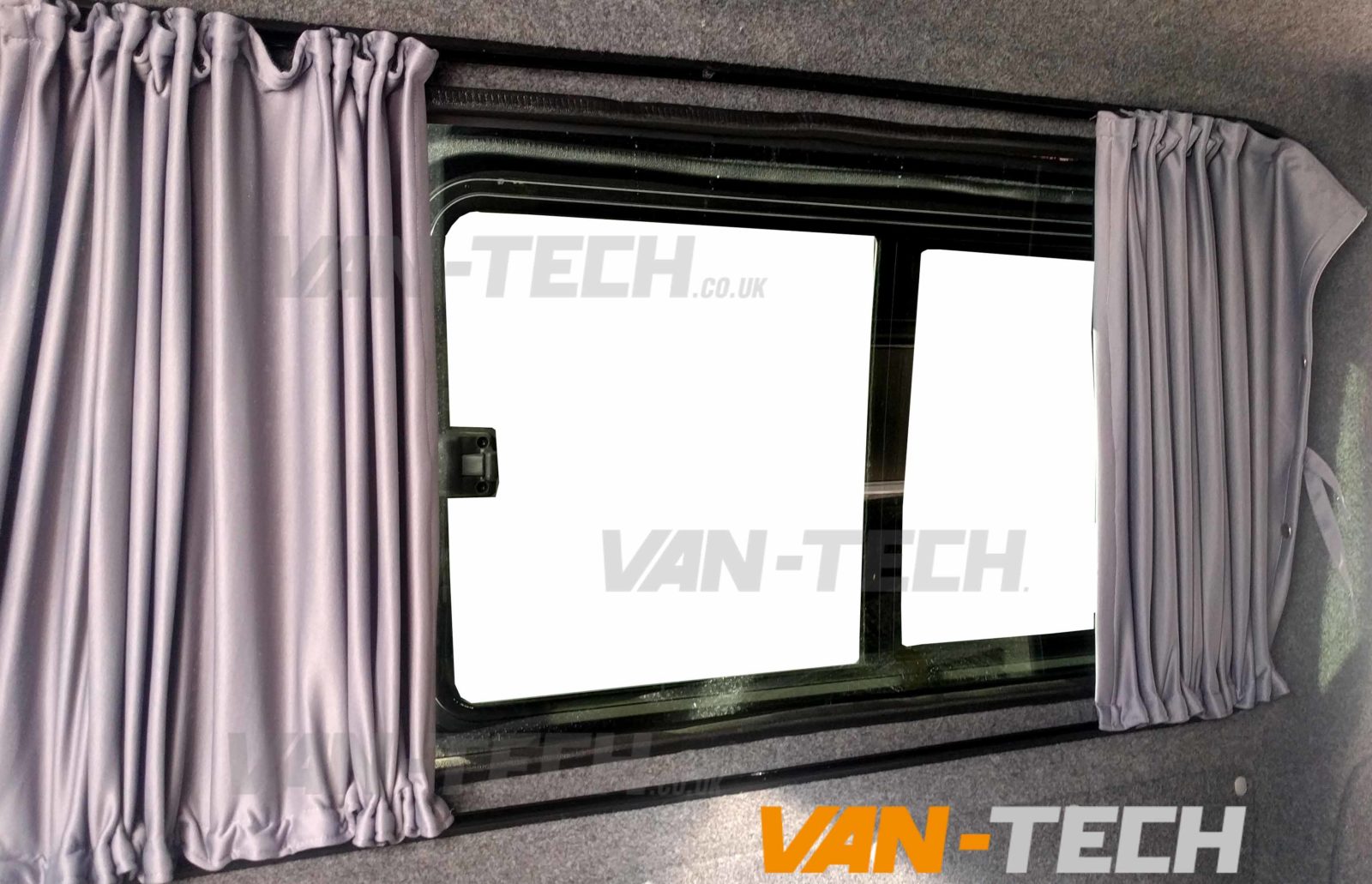 VW-transporter-t5-t5.-t6-black-interior-curtains-8 VW T5 T5.1 Blackout Interior Curtain Half Pack This VW T5 T5.1 Blackout Interior Curtain Half Pack set really looks the part and will give you a nice and simple way to provide some extra privacy to the interior of your vehicle. This Curtain Pack contains: Behind The Driver Curtain Side Loading Door Curtain Tailgate or Barn Door Curtain Available in Black or Grey Please note these curtains will require some minor modification for fitting to Genuine Caravelle Models please call us on 0121 550 4628 for details. High Quality Blackout Curtain Pre drilled runners easy to fit with a screwdriver Tailor made for the VW T5 T5.1 Transporter models increased privacy Fitting kit included 2 colours available Black and Grey (with Black inner lining)