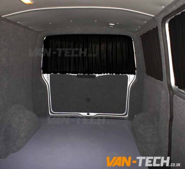 tailgate-curtain-black-1-600x550 VW T5 T5.1 Blackout Interior Curtain Half Pack This VW T5 T5.1 Blackout Interior Curtain Half Pack set really looks the part and will give you a nice and simple way to provide some extra privacy to the interior of your vehicle. This Curtain Pack contains: Behind The Driver Curtain Side Loading Door Curtain Tailgate or Barn Door Curtain Available in Black or Grey Please note these curtains will require some minor modification for fitting to Genuine Caravelle Models please call us on 0121 550 4628 for details. High Quality Blackout Curtain Pre drilled runners easy to fit with a screwdriver Tailor made for the VW T5 T5.1 Transporter models increased privacy Fitting kit included 2 colours available Black and Grey (with Black inner lining)