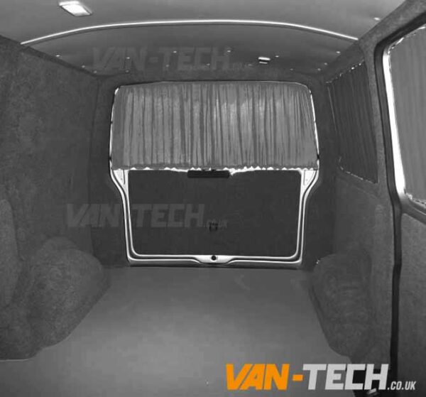 vw-t5-interior-curtyain-tailgate-grey-600x559 VW T5 T5.1 Blackout Interior Curtain Half Pack This VW T5 T5.1 Blackout Interior Curtain Half Pack set really looks the part and will give you a nice and simple way to provide some extra privacy to the interior of your vehicle. This Curtain Pack contains: Behind The Driver Curtain Side Loading Door Curtain Tailgate or Barn Door Curtain Available in Black or Grey Please note these curtains will require some minor modification for fitting to Genuine Caravelle Models please call us on 0121 550 4628 for details. High Quality Blackout Curtain Pre drilled runners easy to fit with a screwdriver Tailor made for the VW T5 T5.1 Transporter models increased privacy Fitting kit included 2 colours available Black and Grey (with Black inner lining)