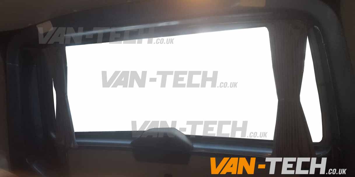 vw-transporter-interior-curtains-tailgate VW T5 T5.1 Blackout Interior Curtain Barn Door This VW T5 T5.1 Blackout Interior Curtain Barn Door and Rail set really looks the part and will give you a nice and simple way to provide some extra privacy to the interior of your vehicle. Please note, the current stock are supplied with Black Rails. Please note these curtains will require some minor modification for fitting to Genuine Caravelle Models please call us on 0121 550 4628 for details. Product features: High Quality Blackout Curtain Pre drilled runners easy to fit with a screwdriver Tailor made for the VW T5 T5.1 Transporter models increased privacy Fitting kit included 2 colours available Black and Grey (with Black inner lining)