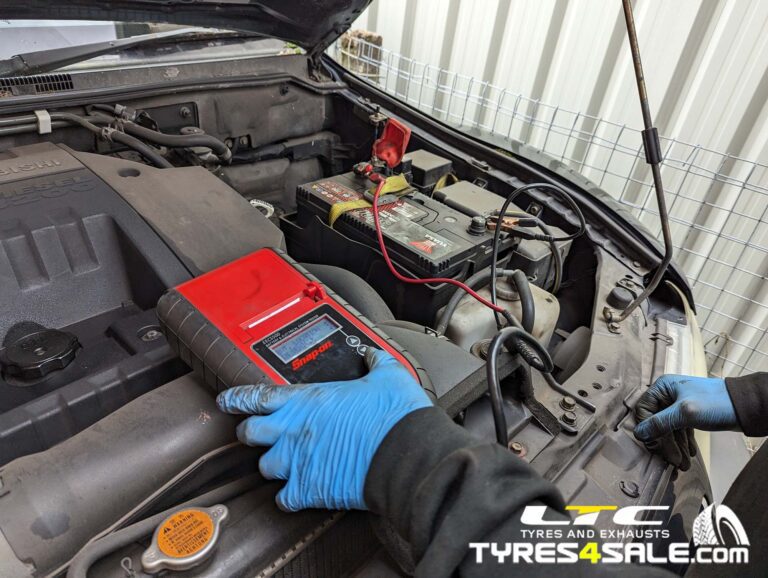 Charging rate being checked on a car battery at LTC Tyres and Exhausts