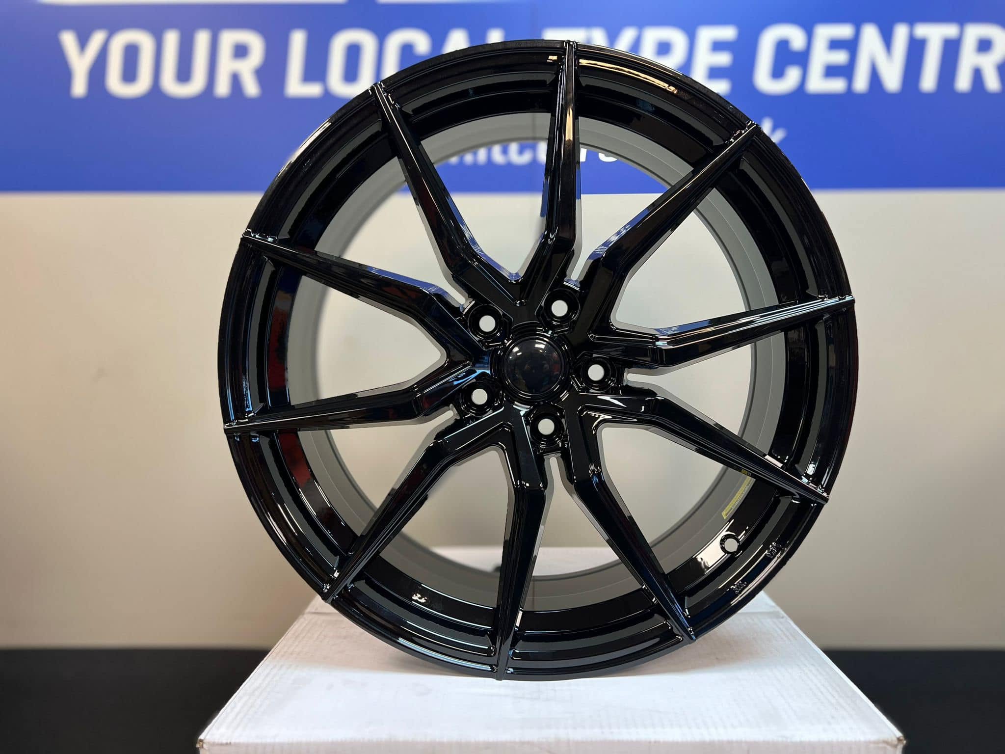 Modern gloss black performance alloy wheel from LTC Tyres