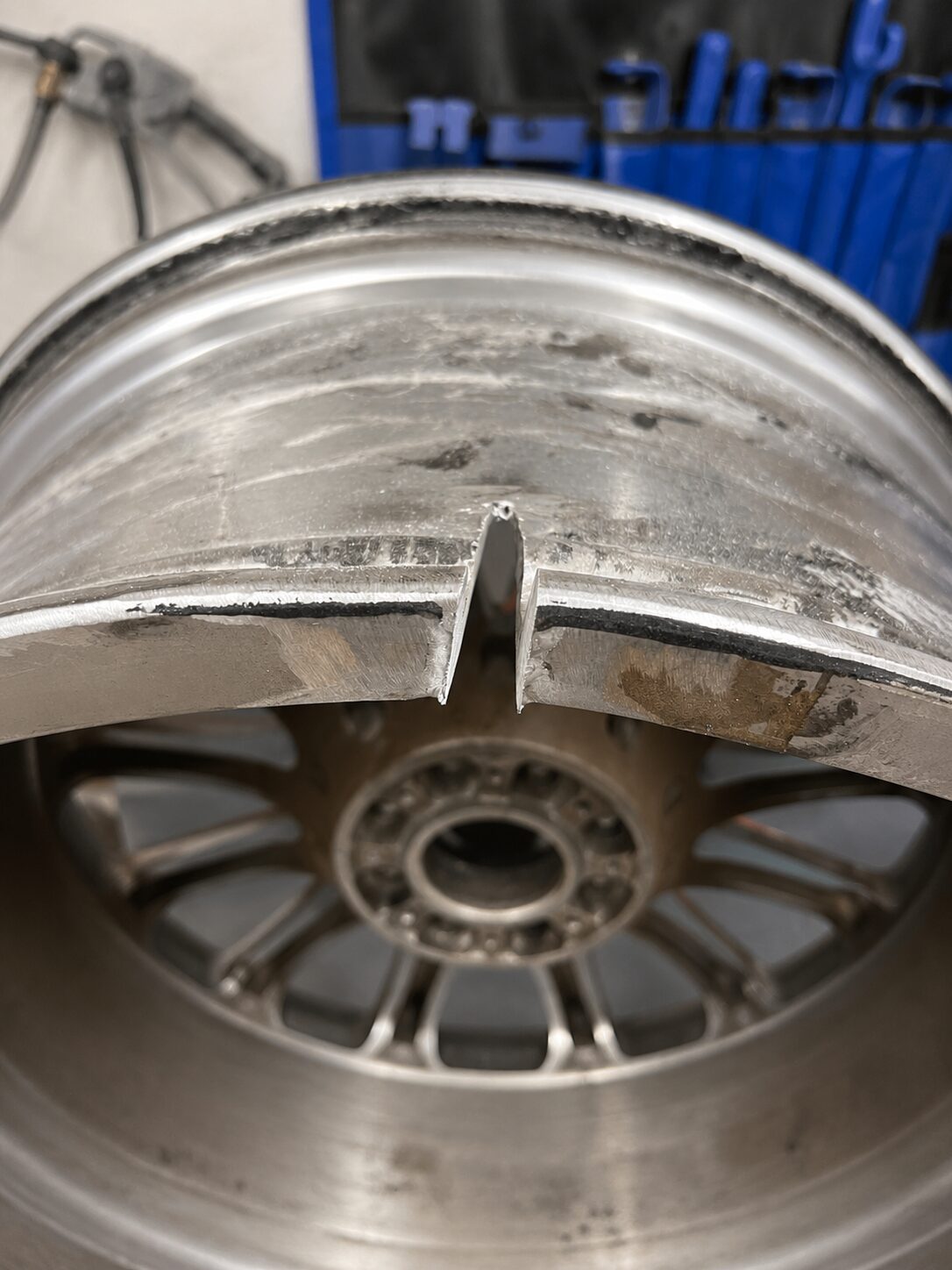 Cracked alloy wheel prepared before welding at LTC Tyres and Exhausts