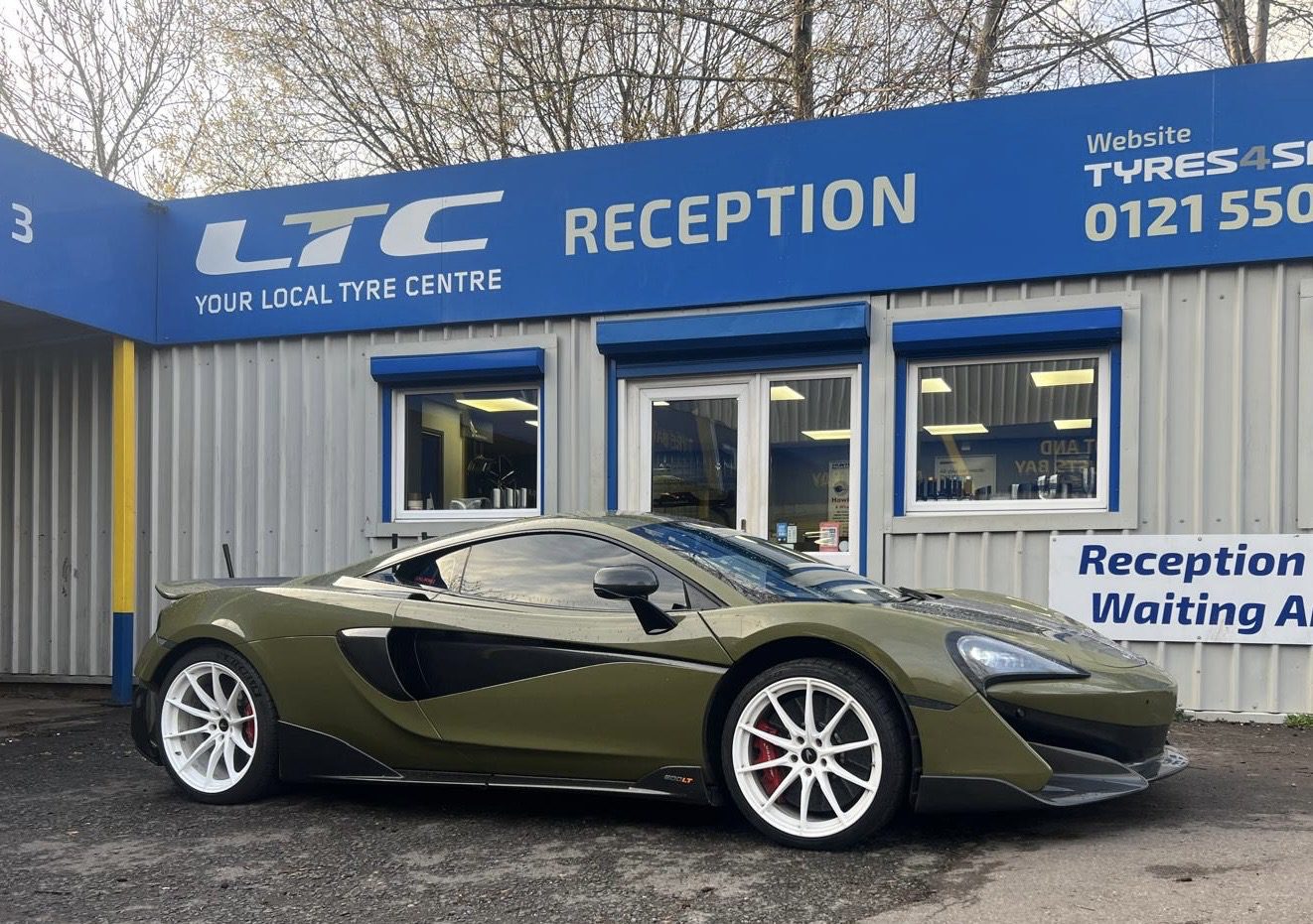 McLaren sports car following alloy wheel repair and wheel alignment check