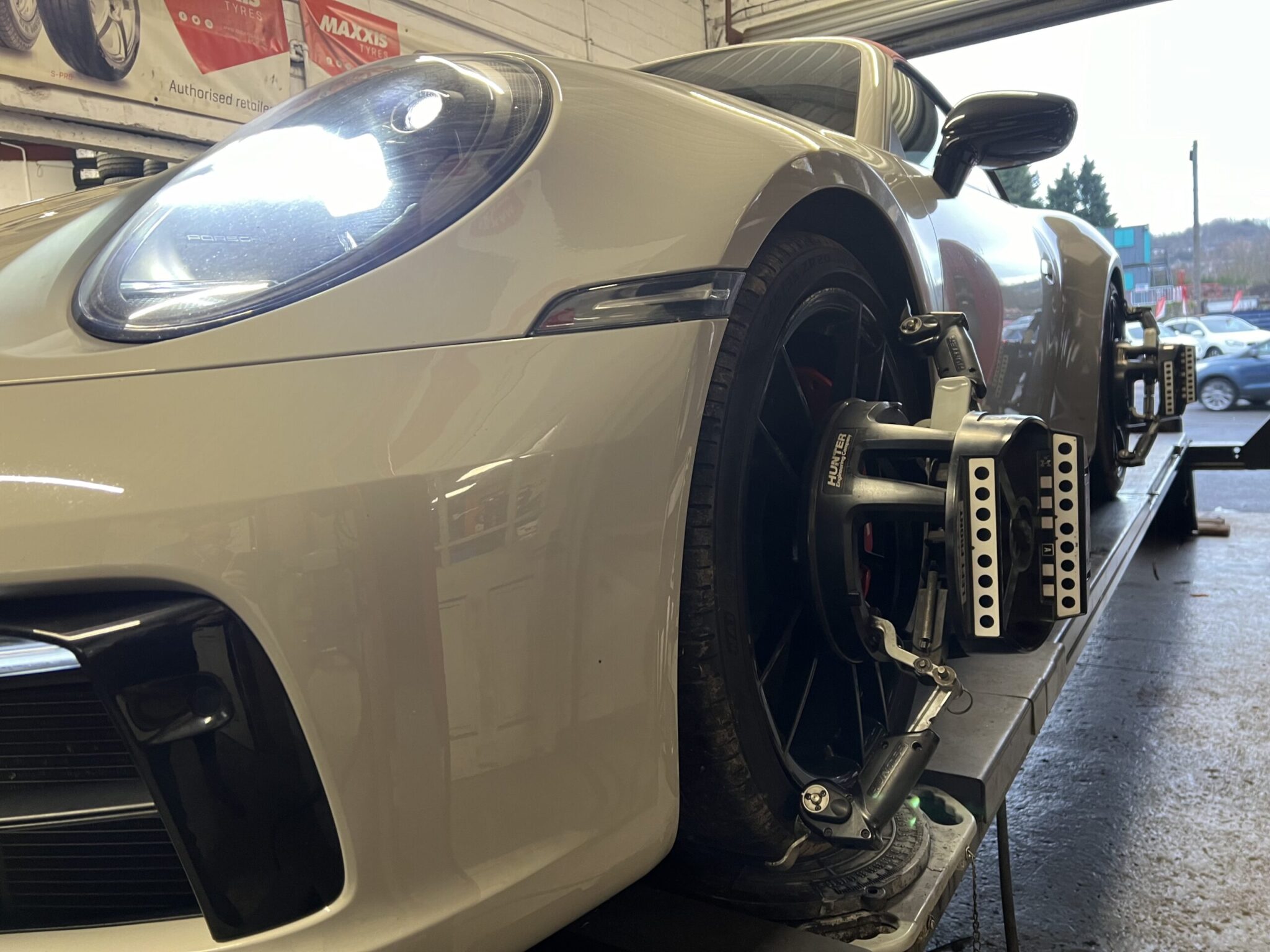 Porsche undergoing Hunter wheel alignment at LTC Tyres and Exhausts