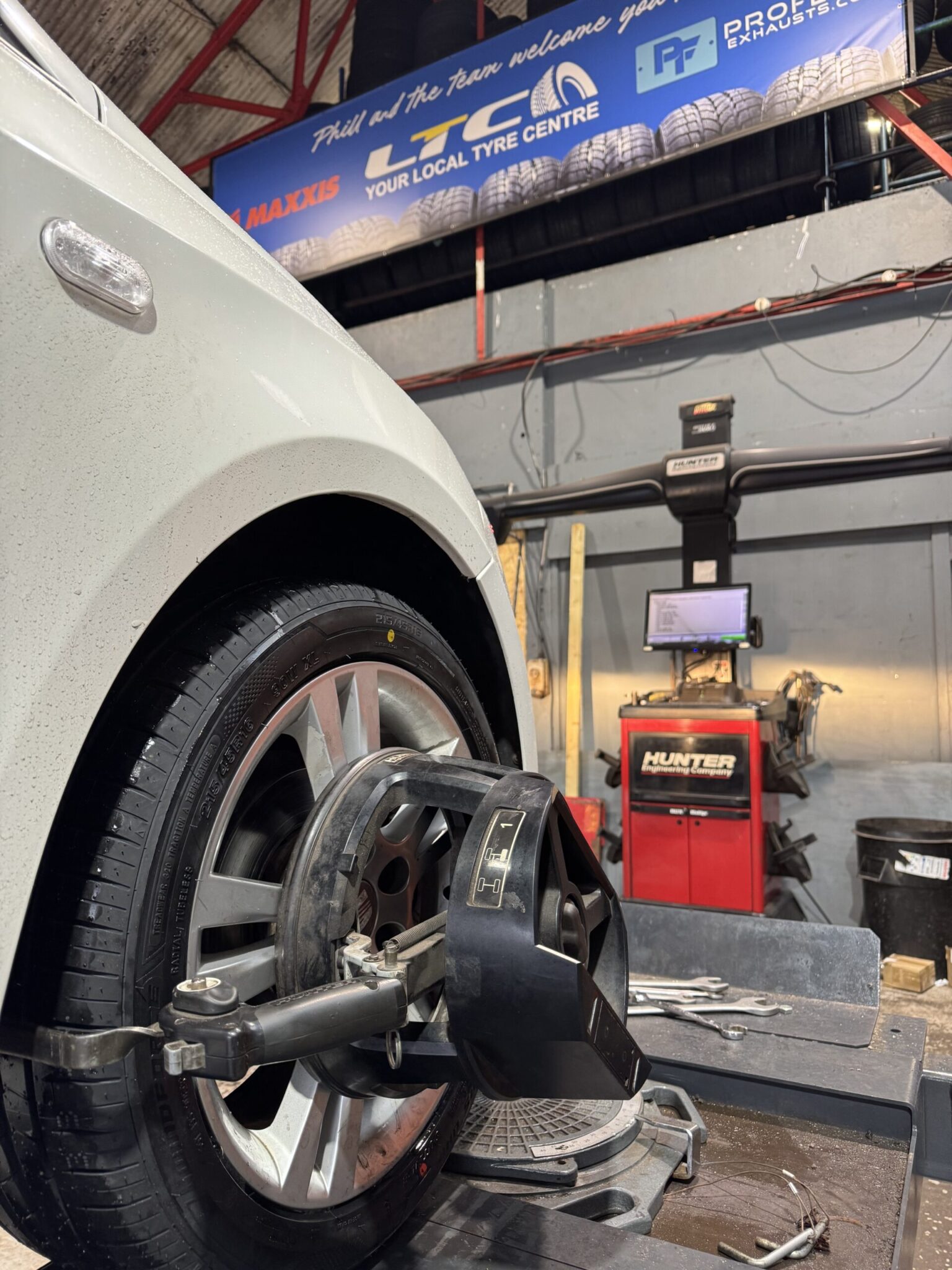 Vehicle undergoing professional Hunter wheel alignment at LTC Tyres and Exhausts