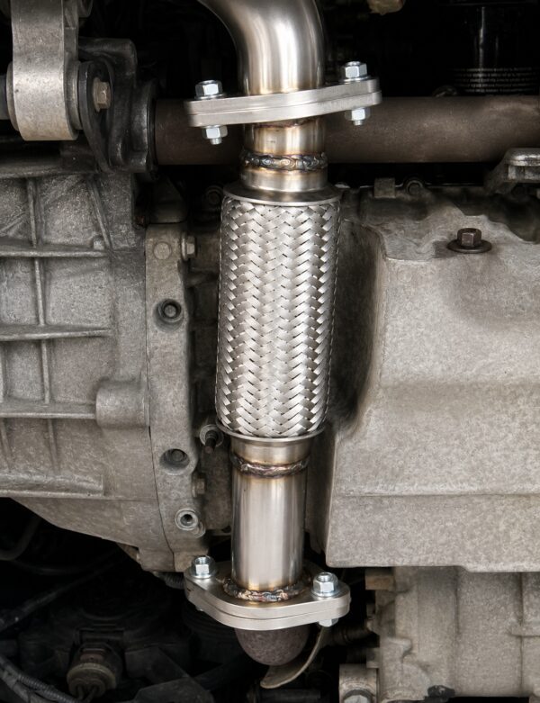 Damaged exhaust flexi pipe being repaired by LTC Tyres and Exhausts